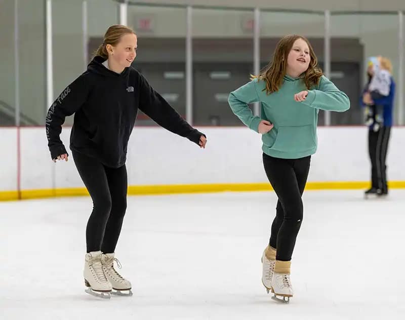 Two Girls On Skates